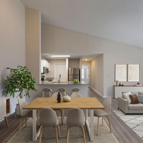 a living room with a dining table and couches